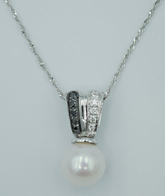 collana nimei in oro bianco con diamanti  neri e bianchi  e perla rosè - siciliano gioielli