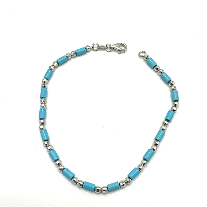 Bracciale Oro Bianco e Pasta di Turchese