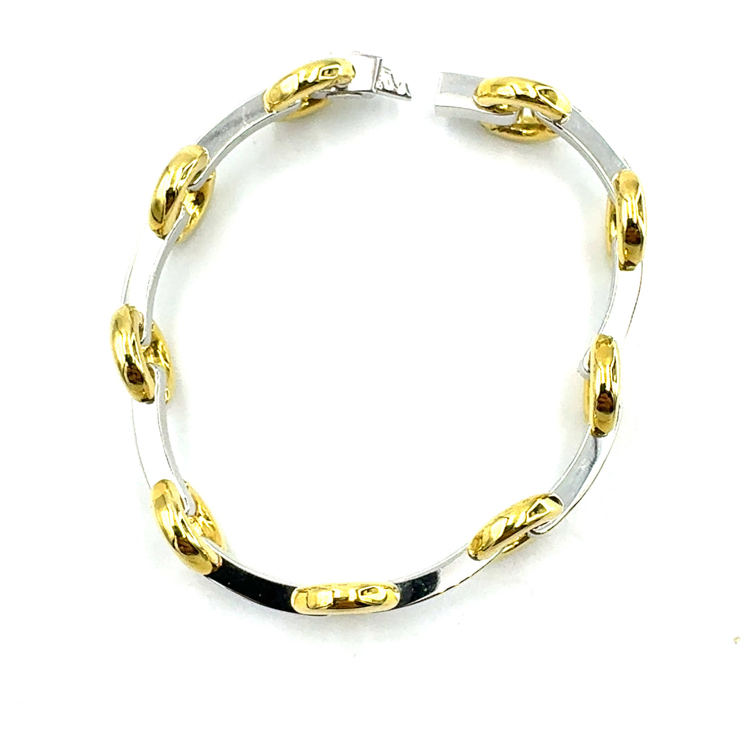 Semi-rigid bracelet in yellow gold
