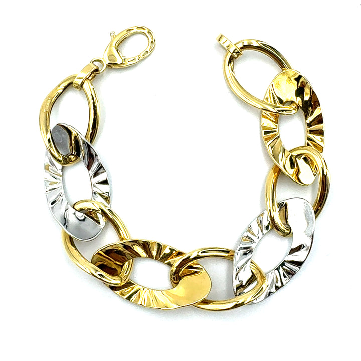 Semi-rigid bracelet in yellow gold