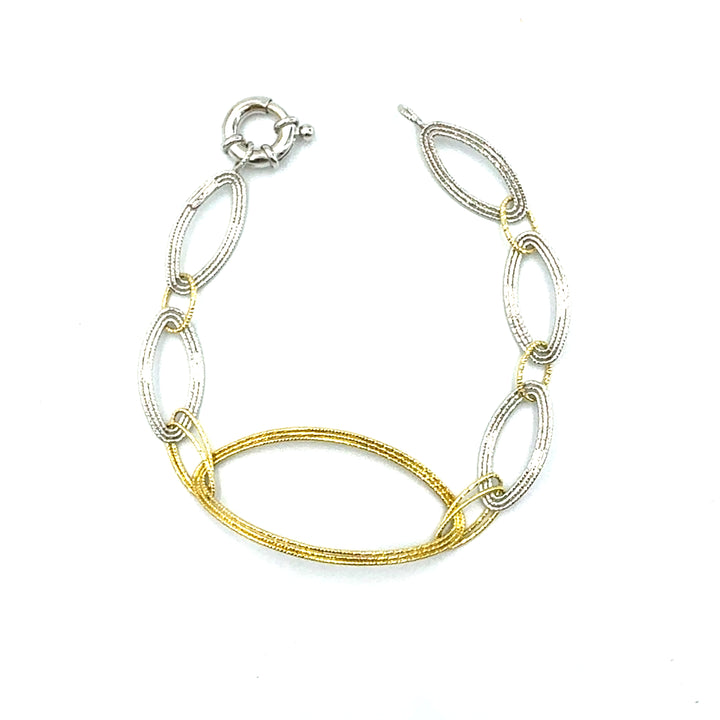 Semi-rigid bracelet in yellow gold