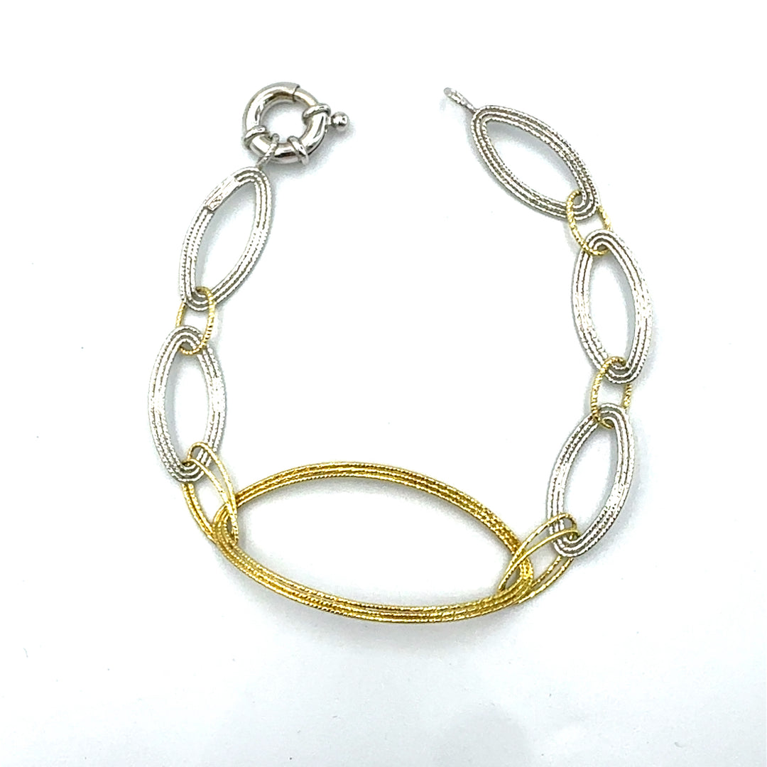 Semi-rigid bracelet in yellow gold