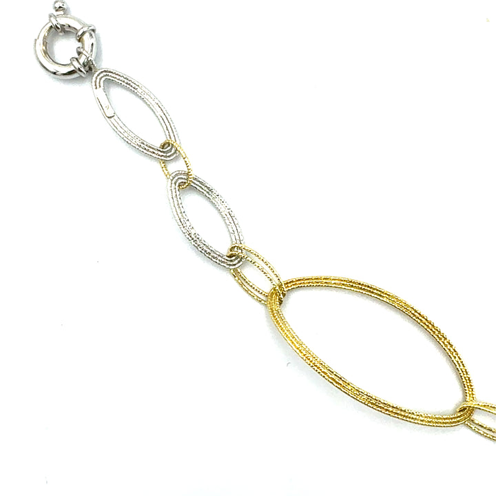 Semi-rigid bracelet in yellow gold