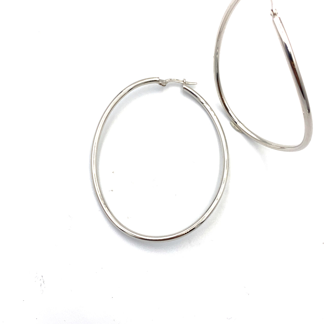 orecchini in oro bianco  di  forma ovale siciliano gioielli 