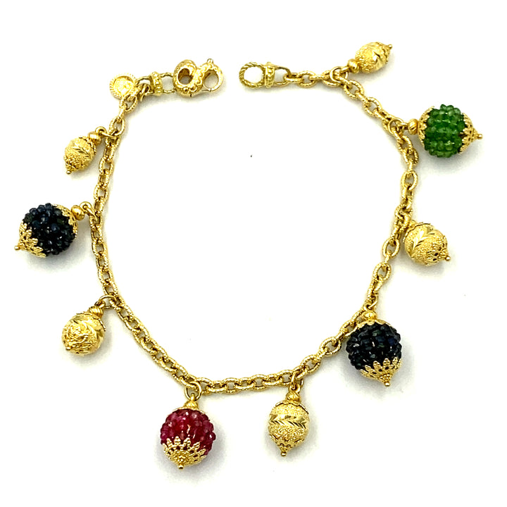 bracciale sun day  oro giallo con  zaffiri rubini e smeraldi - siciliano gioielli  