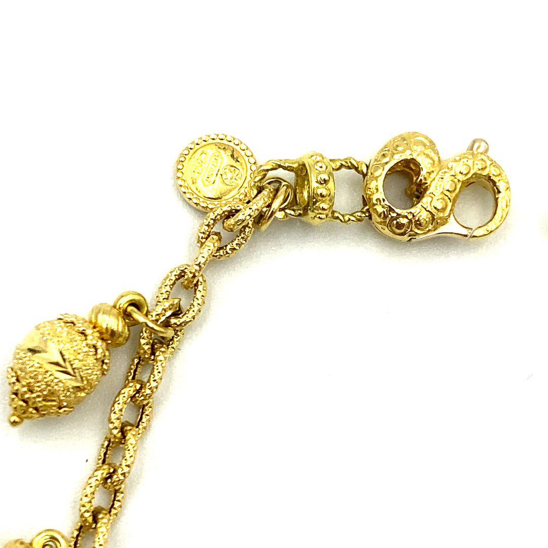 bracciale sun day oro giallo con zaffiri rubini e smeraldi - siciliano gioielli