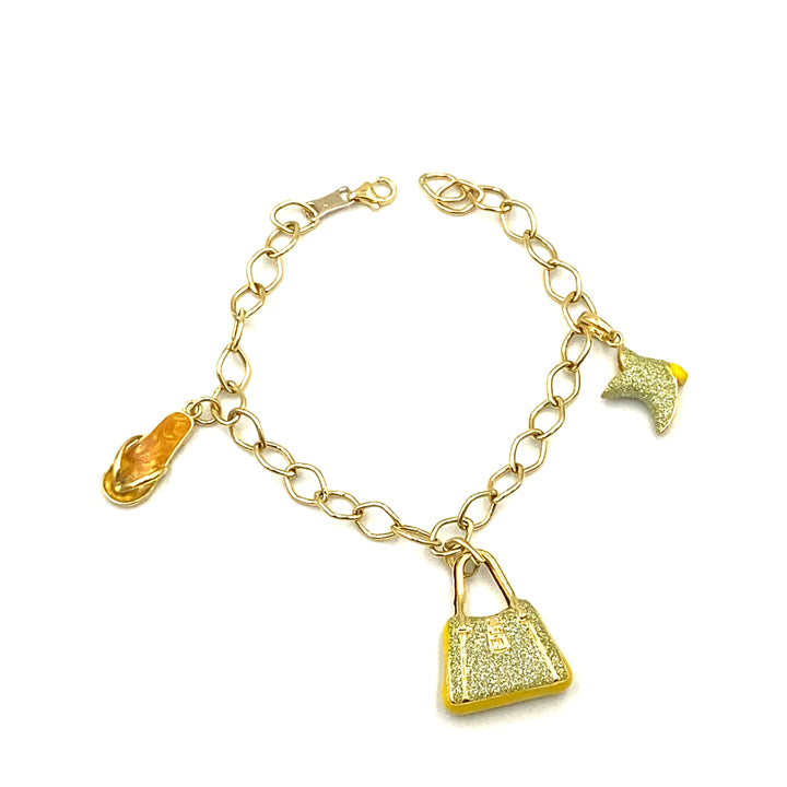 bracciale in oro giallo con charms siciliano gioielli