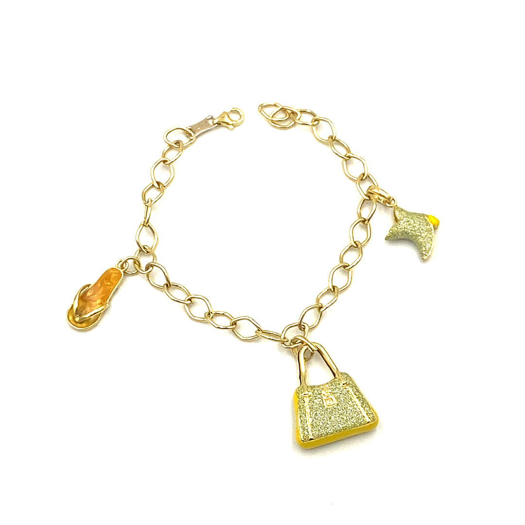 bracciale in oro giallo con charms siciliano gioielli