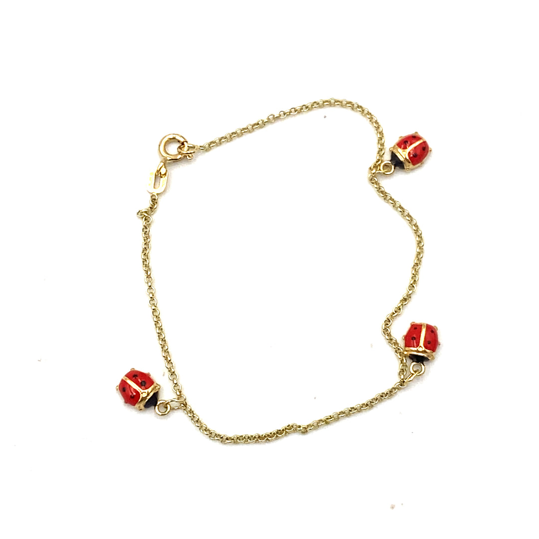 bracciale in oro giallo con coccinelle smaltate siciliano gioielli