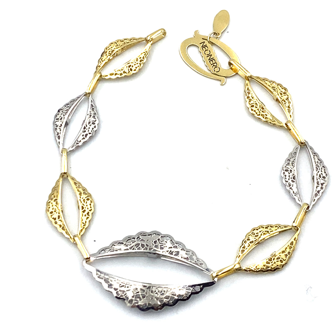 bracciale in oro bicolore neonero con elementi  traforati  - siciliano  gioielli 