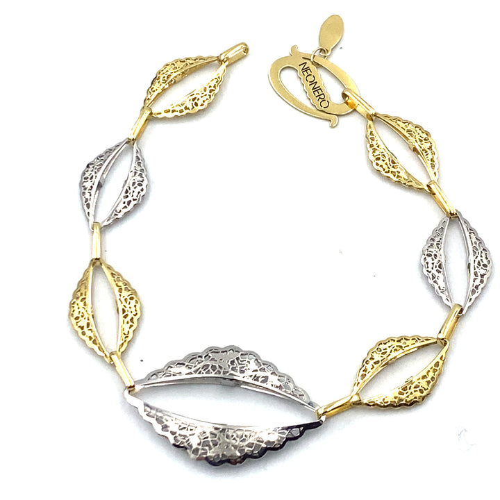 bracciale in oro bicolore neonero con elementi  traforati  - siciliano  gioielli 
