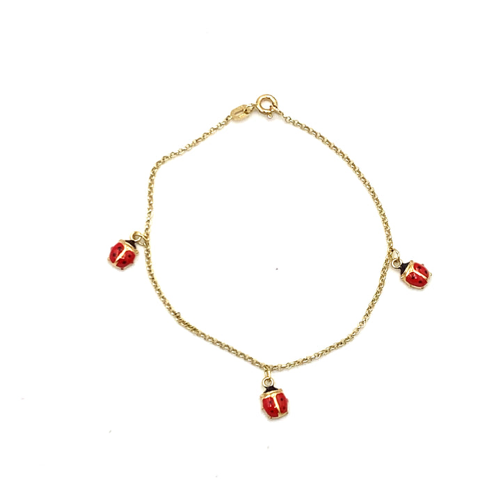 bracciale in oro giallo con coccinelle smaltate siciliano gioielli