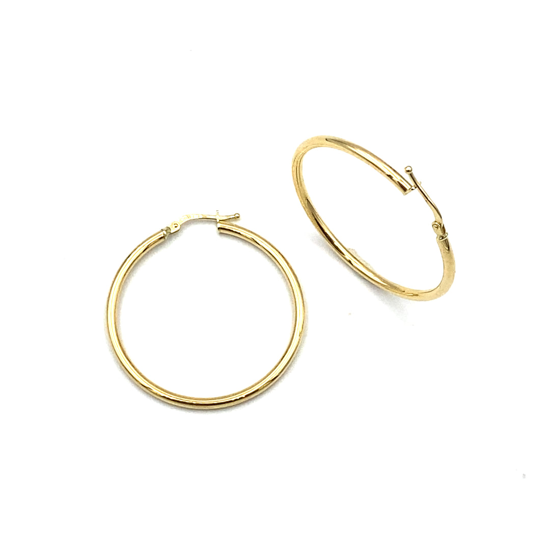 orecchini in oro giallo  a cerchio siciliano gioielli  da donna 